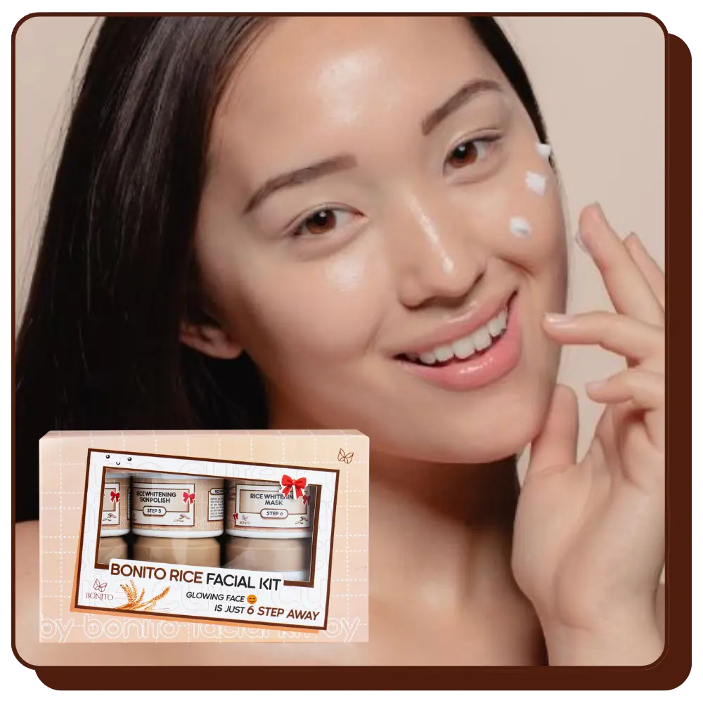 Woman applying cream to her face with a Bonito Rice Facial Kit box in the corner.